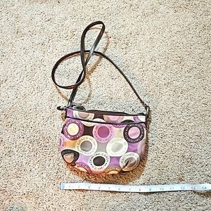 Purple and brown coach purse